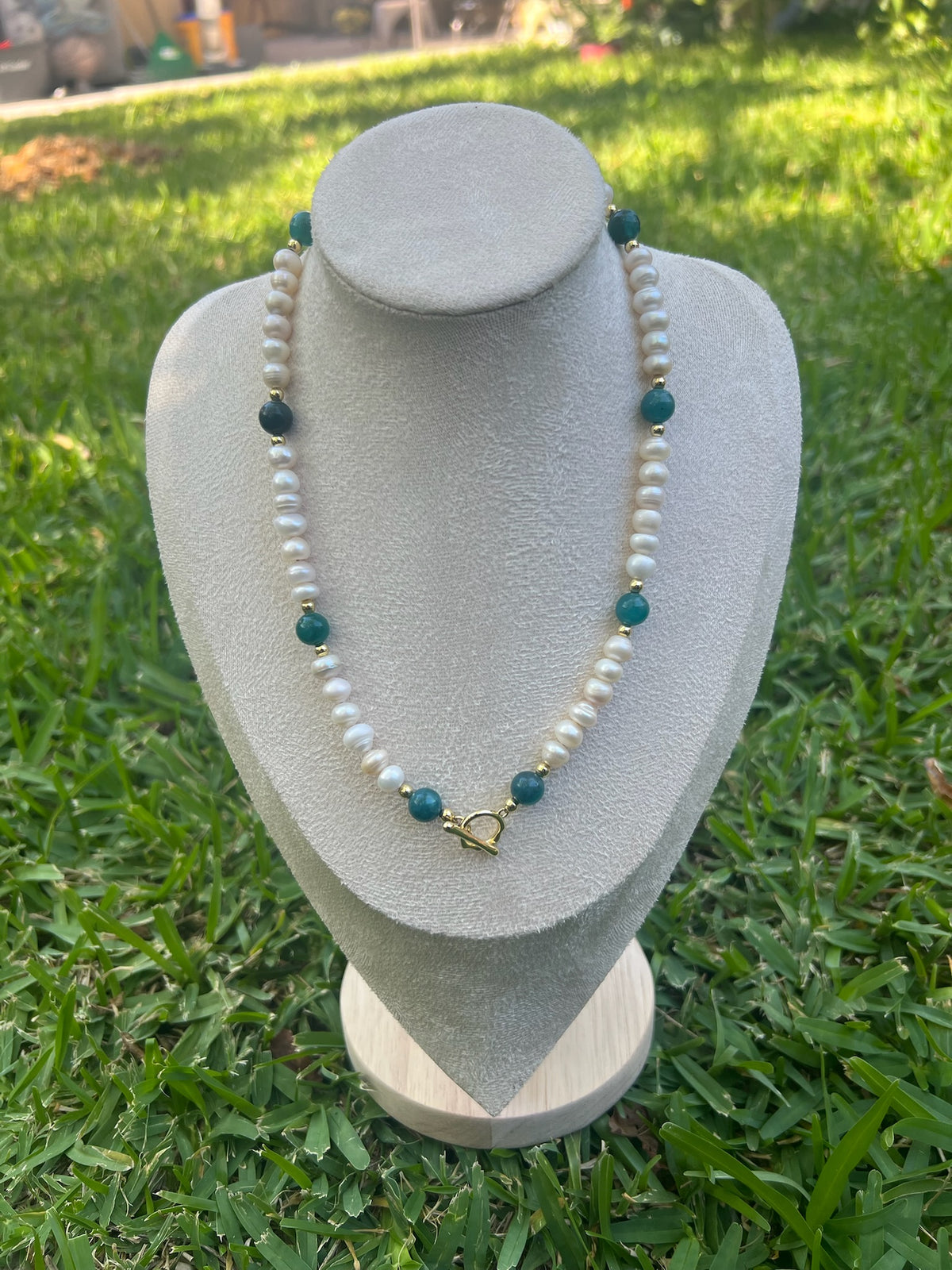 Freshwater pearl necklace with blue agate, gold filled spacers and toggle clasp.